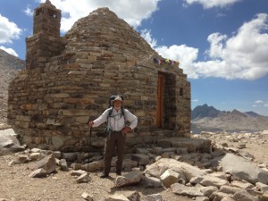 Standing in front of a refuge hut on Muir Pass.